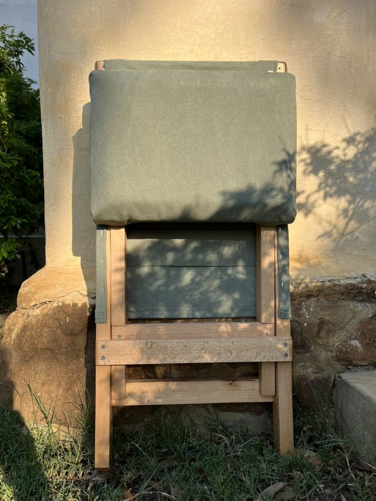 Beech folding chair folded flat